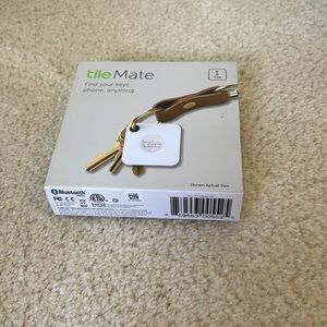 Tile Mate. Brand new. Never opened/used.